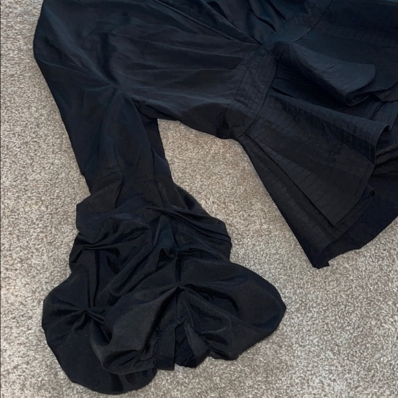 Black Blouse with Puff Sleeves and Hem Design - Picture 2 of 5